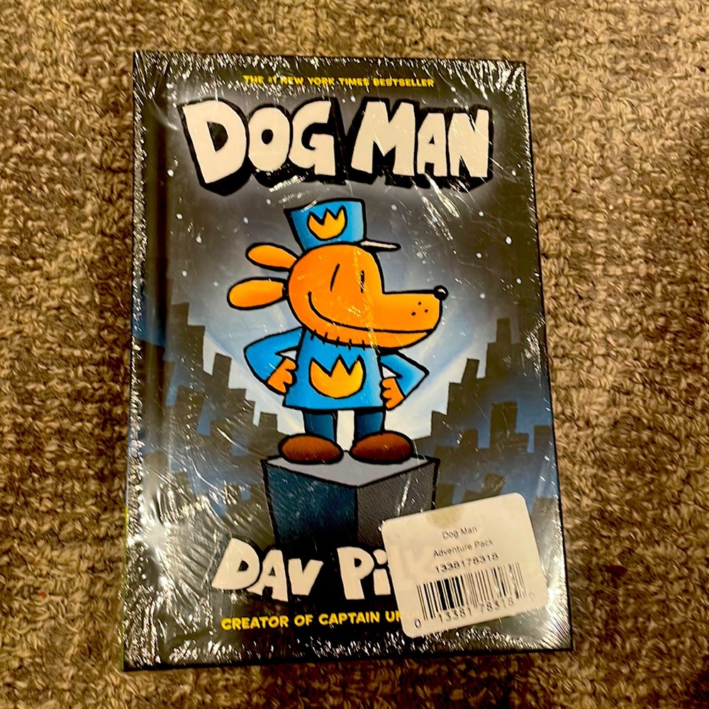 Scholastic to pack dog man, books
